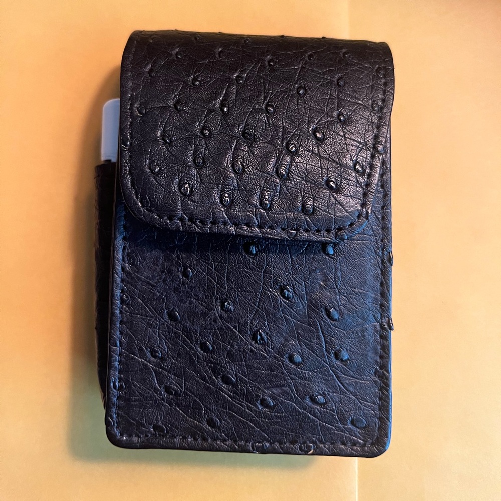 Malock leather vintage case. Excellent condition. 4" in height.